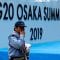 A security officer walks past at the venue of G20 leaders summit in Osaka, western Japan