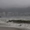 A view of a beach as waves move toward the shore during rainfall brought on by Hurricane Raymond, in Acapulco